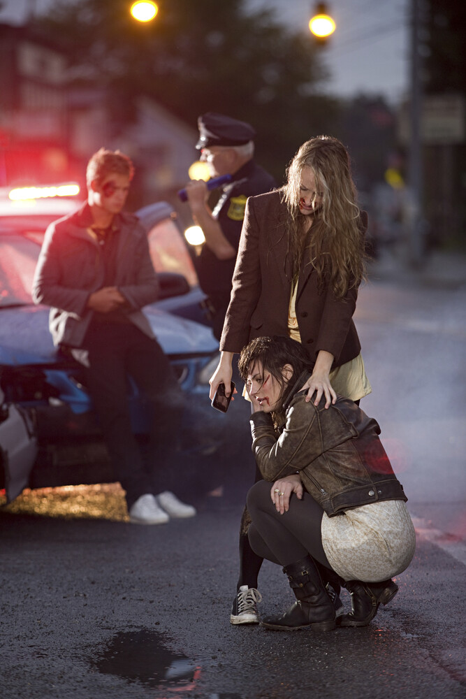 Police and people in car accident