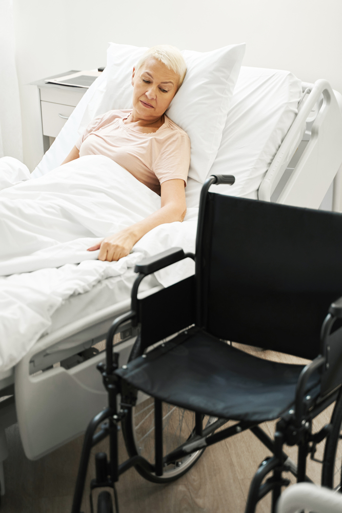 Long term disability patient in hospital bed